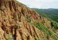 Stobskie piramidy or StobÃ¢â¬â¢s Pyramids unusual shaped red and yellow rock formation Royalty Free Stock Photo